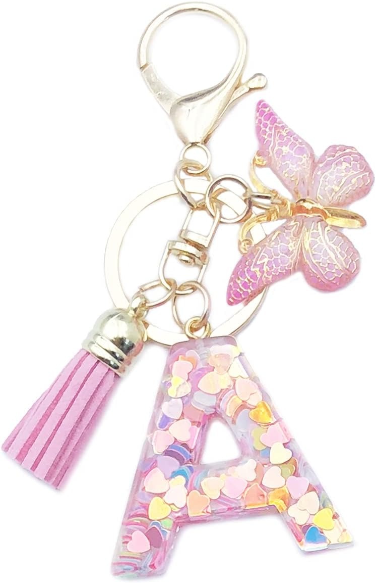 Keychain with letter 'A' charm, tassel, and butterfly